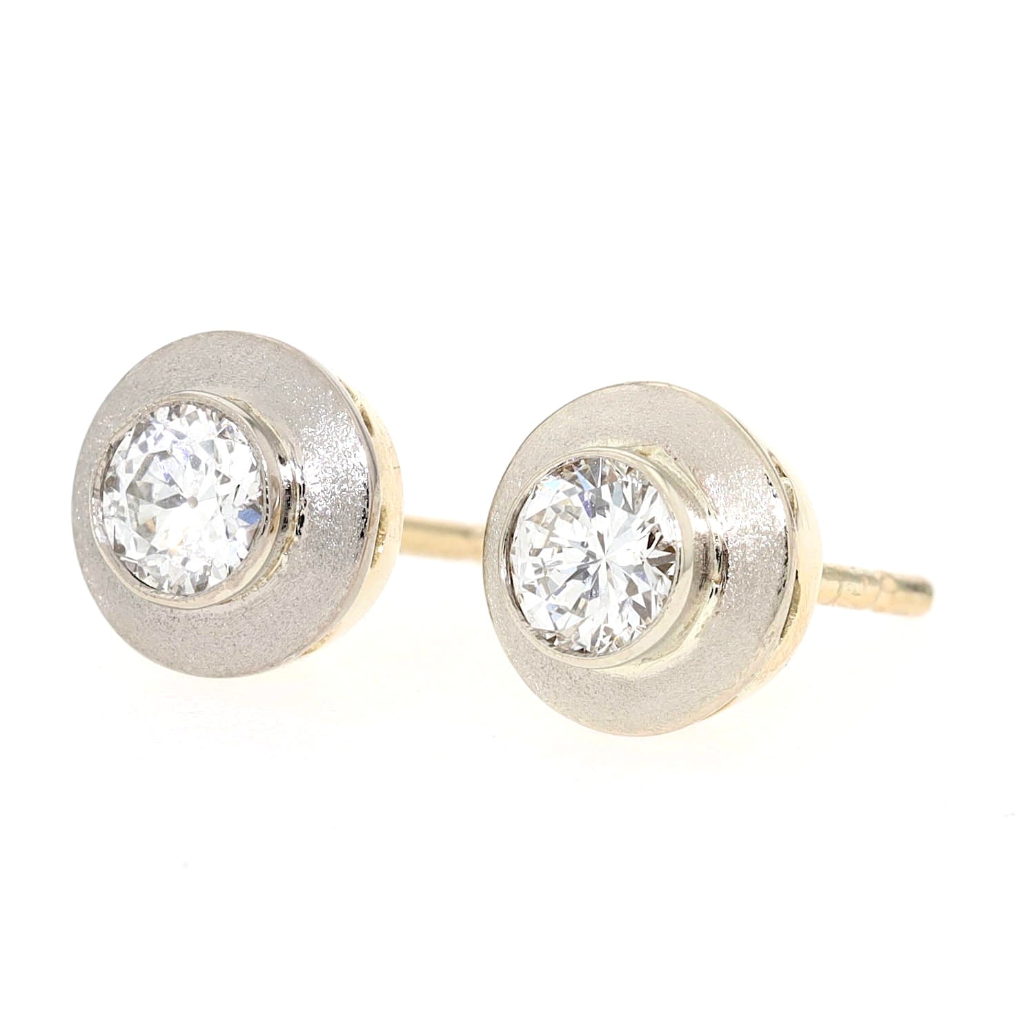 Ohrstecker in 585er Gelb- und Weißgold mit je einem Brillanten, insgesamt ca. 0,60 ct, liegend links gedreht