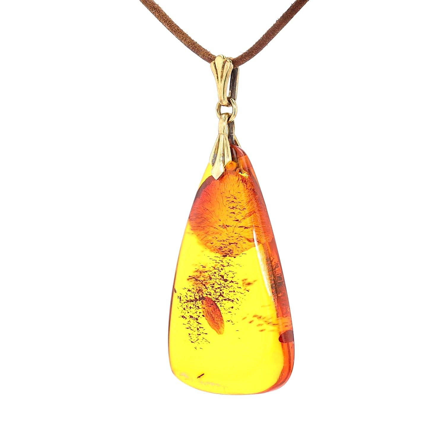 Amber pendant with a setting made of 835 silver, gold-plated, hanging turned left