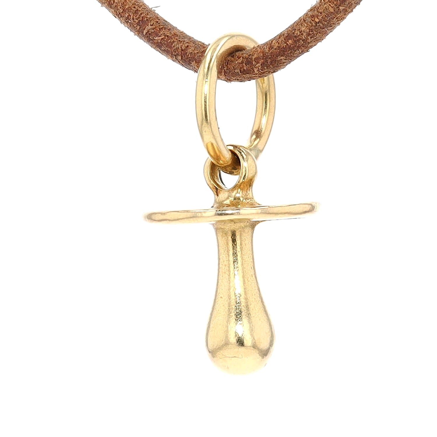 Pendant made of 750 yellow gold in the shape of a pacifier, hanging turned left