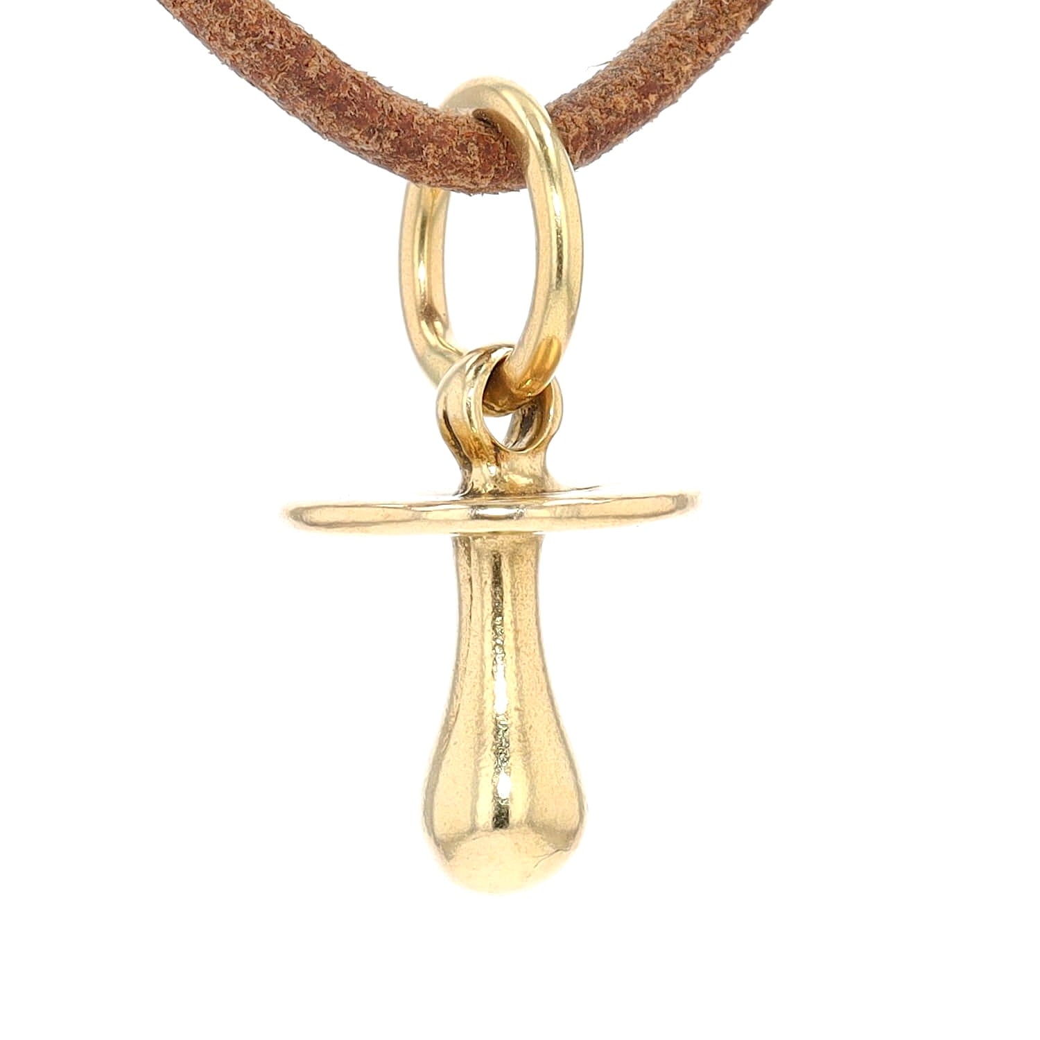 Pendant made of 750 yellow gold in the shape of a pacifier, hanging turned to the right