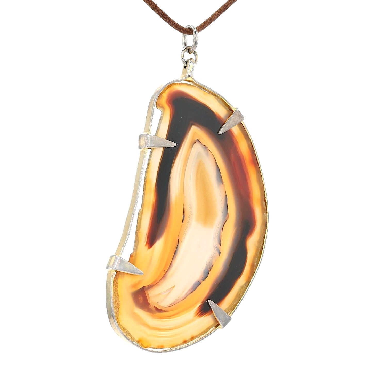 Large pendant made of agate set in metal, hanging turned to the right