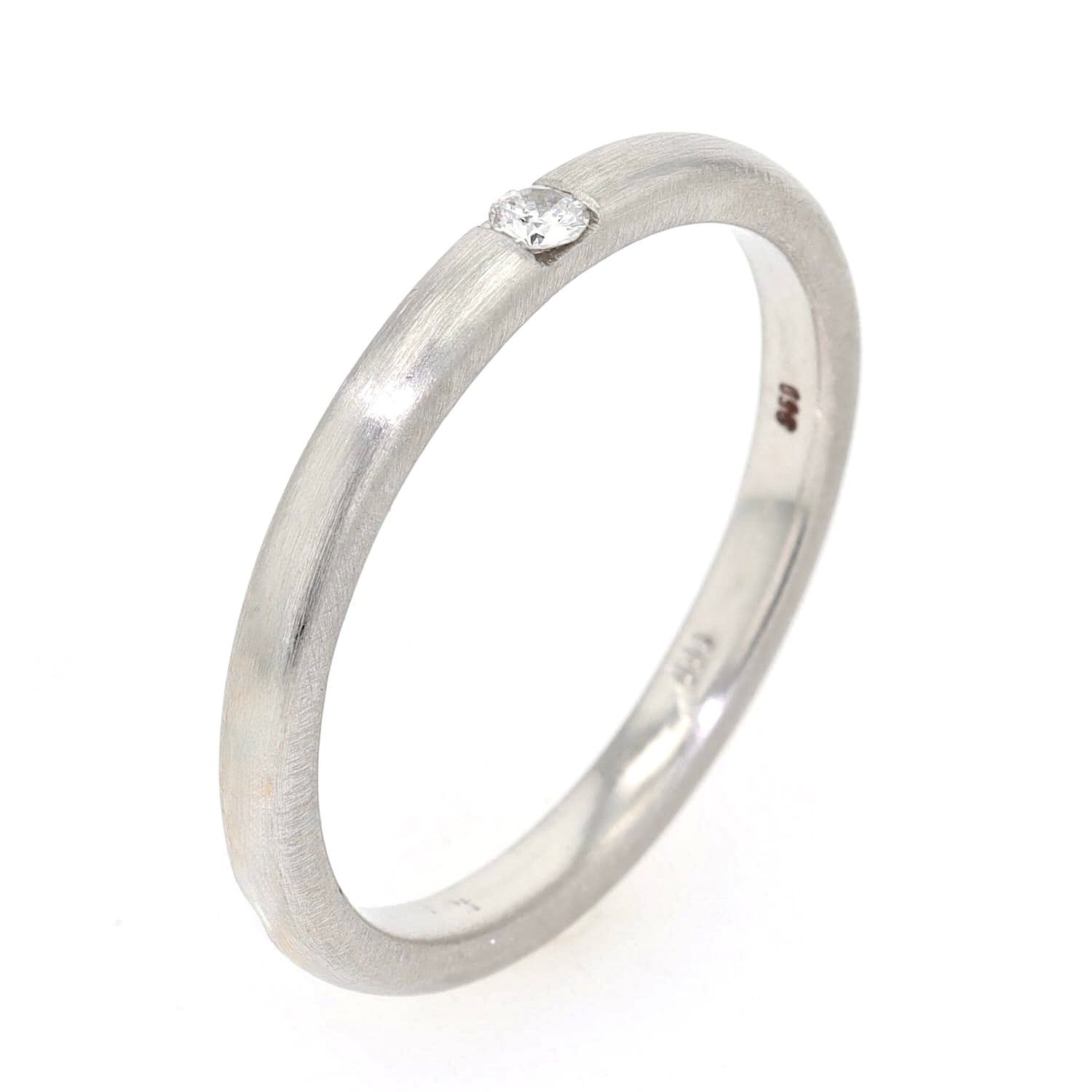 Ring in 860er Platin mit einem Brillanten, stehend