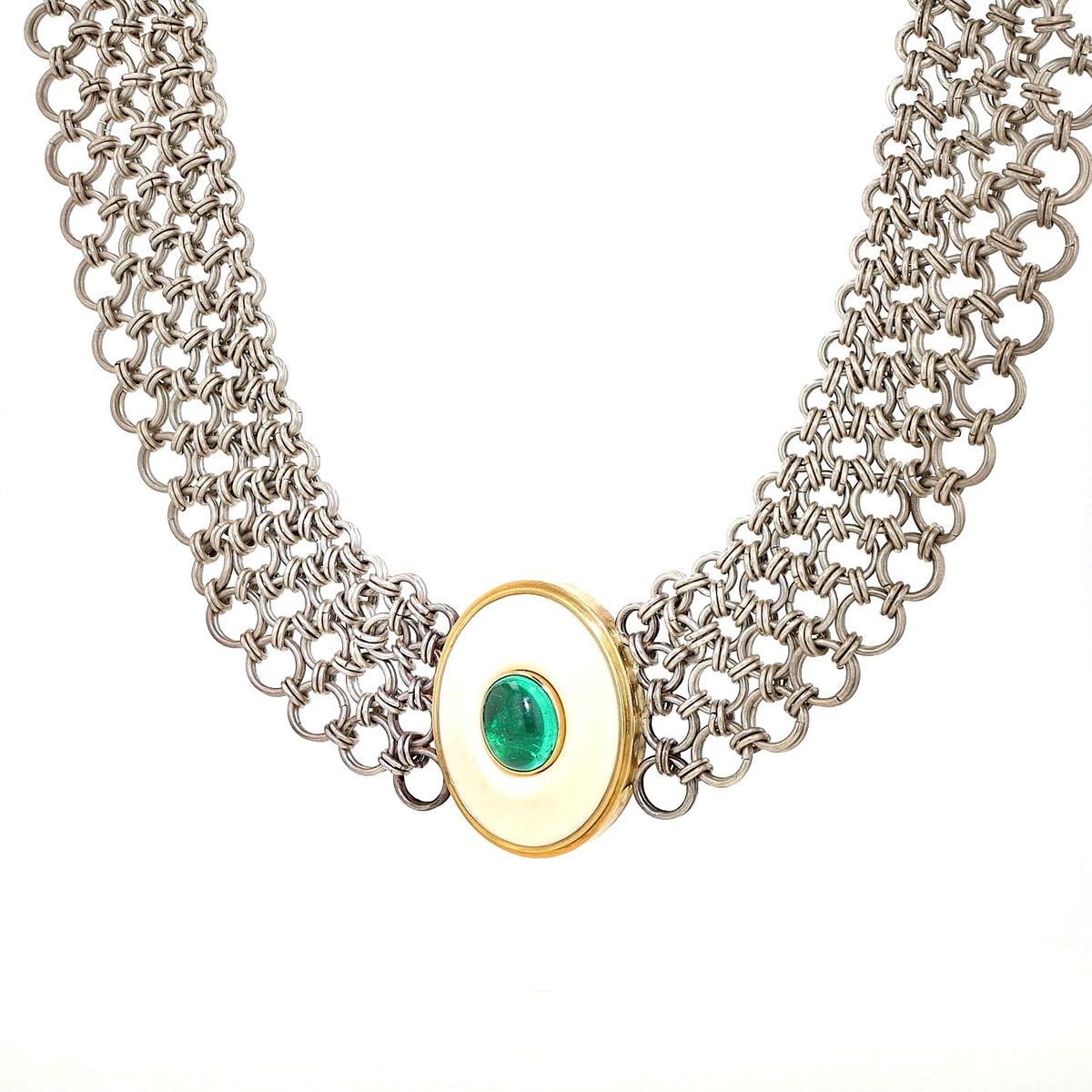 Vintage necklace made of silver, 750 yellow gold and a plate made of bone with an oval emerald cabochon, hanging from the front slightly turned to the left