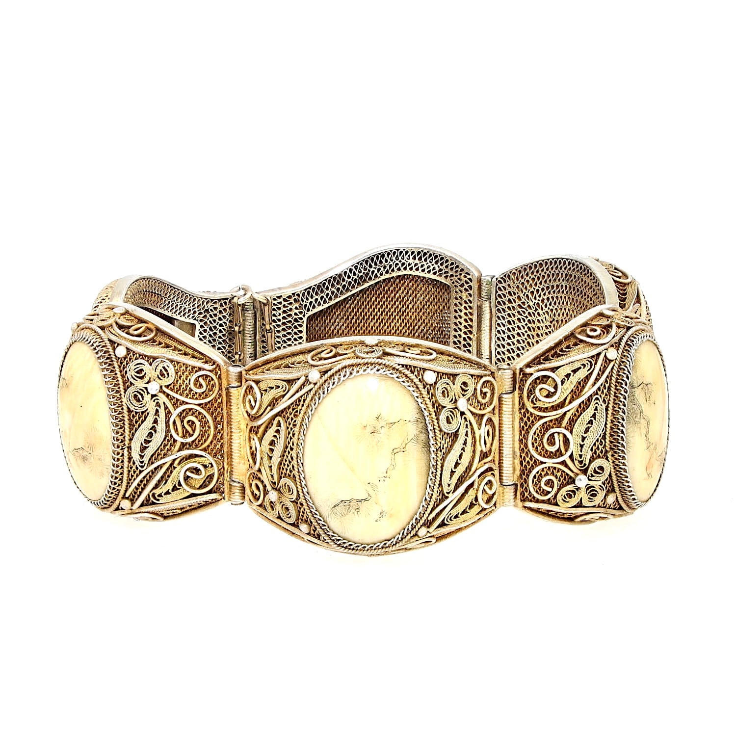 Chinese bracelet from around 1900 in silver, gold-plated with bone, lying closed and slightly turned to the right