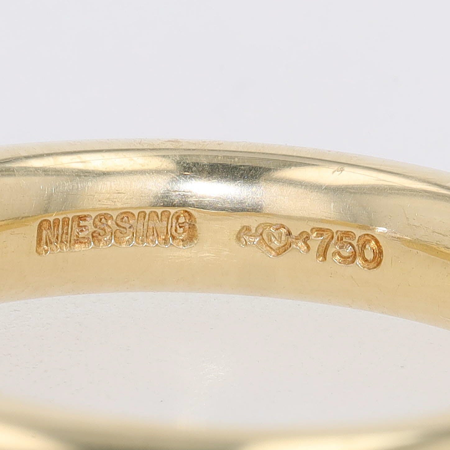 Niessing Spannring in 750er Gelbgold mit einem Brillanten ca. 1,0 ct, Signatur