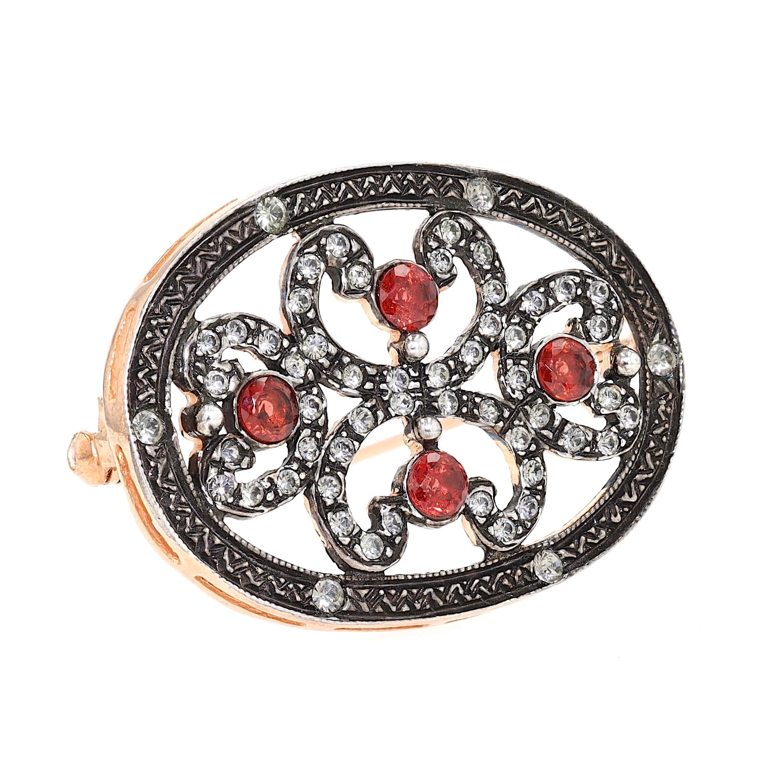 Italian brooch made of 925 silver, gold-plated with red and white glass stones, turned to the right