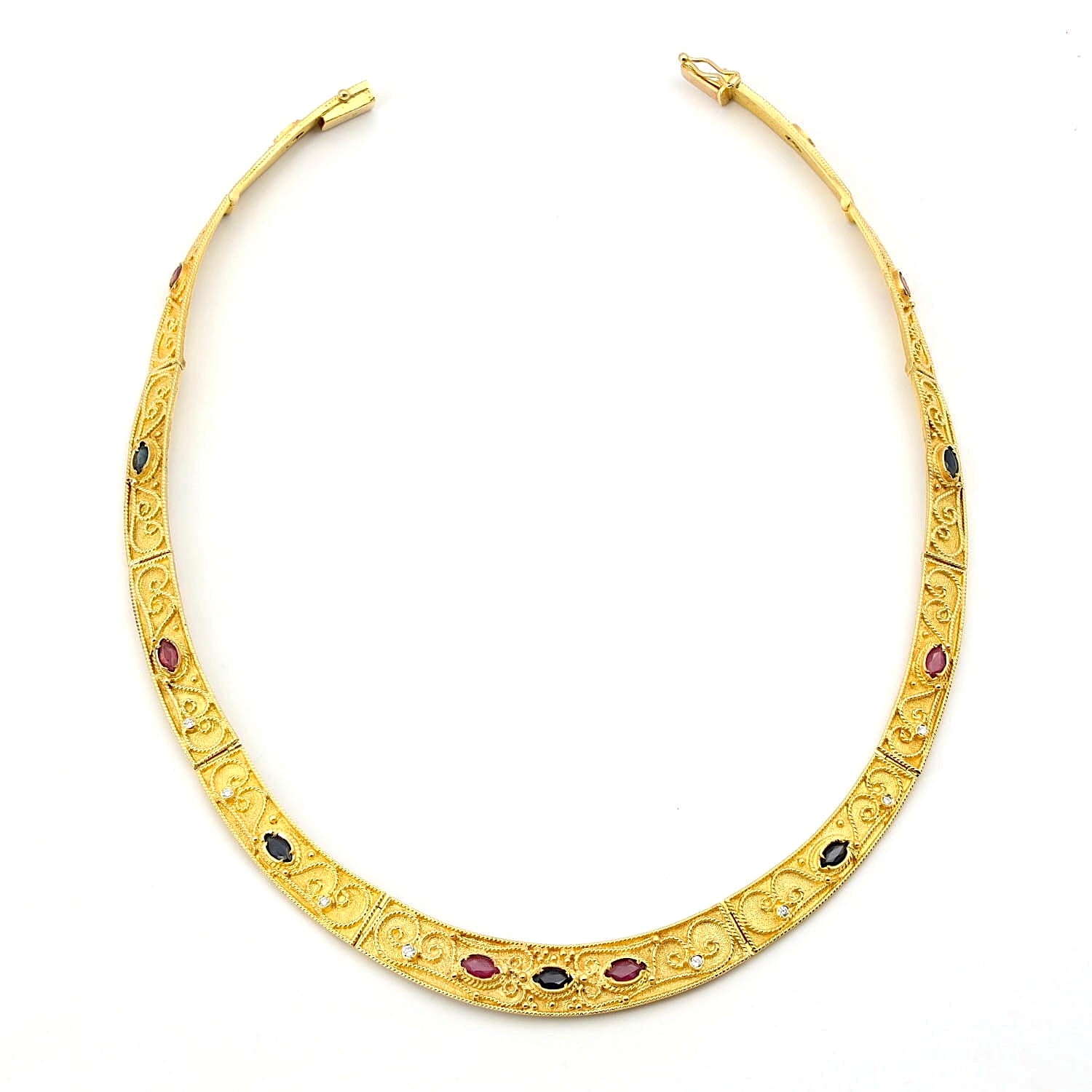 Heavy, luxurious necklace in 750 yellow gold with blue sapphires, rubies and Brilliants, lying slightly open
