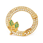 Brooch in 750 yellow gold with brilliants and emeralds