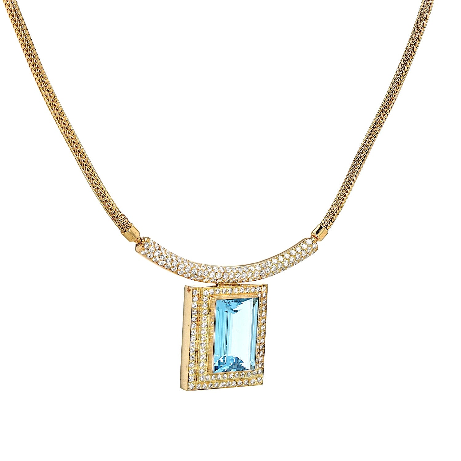 Collier in 750er Gelbgold mit einem blauen Edeltopas und Brillanten, hängend rechts gedreht