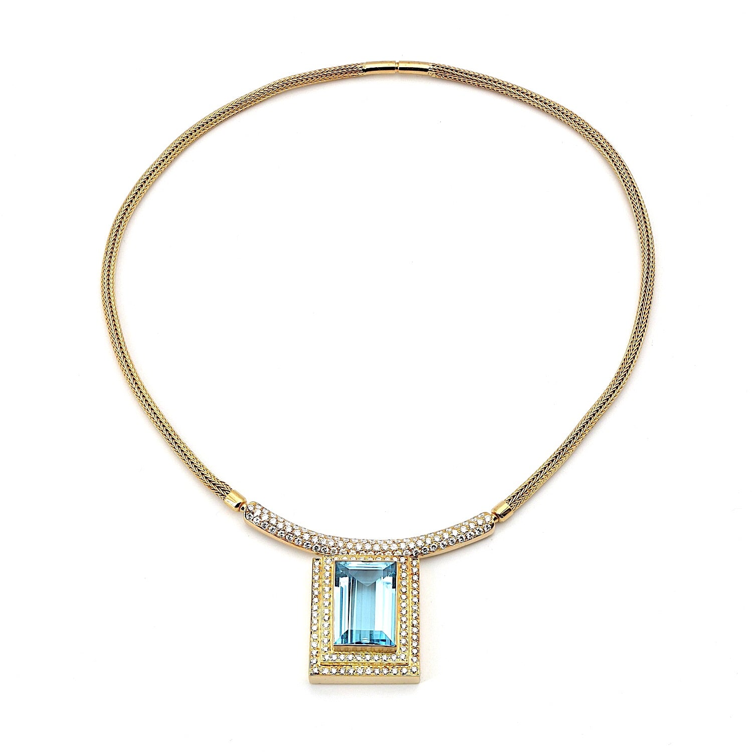 Collier in 750er Gelbgold mit einem blauen Edeltopas und Brillanten, liegend Draufsicht