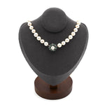 Akoya cultured pearl necklace with a 585 white gold clasp with diamonds and emeralds