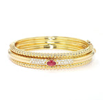 Exclusive Piaget bangle in 750 yellow gold with one Ruby and one brilliants