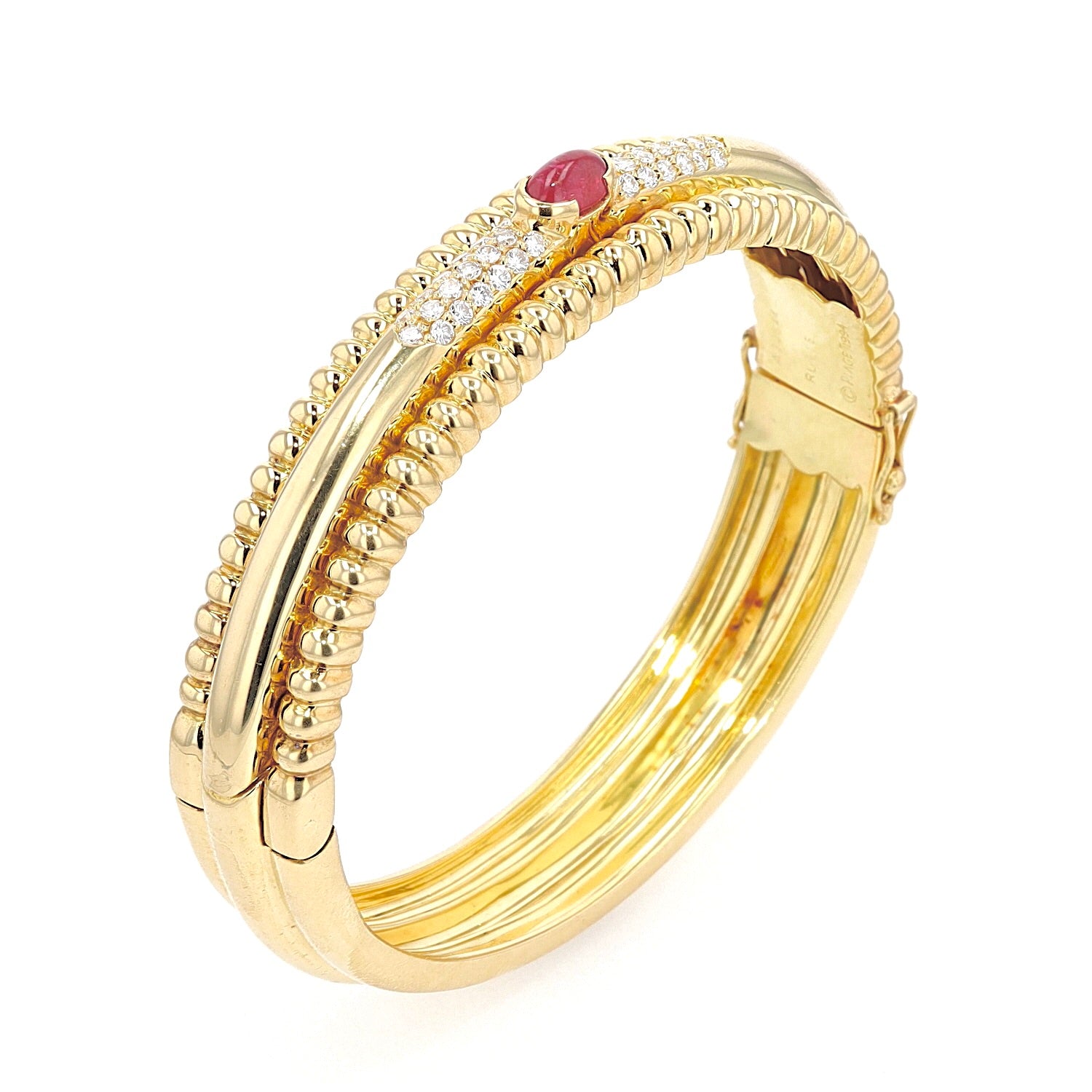 Exclusive Piaget bangle in 750 yellow gold with one Ruby and one brilliants