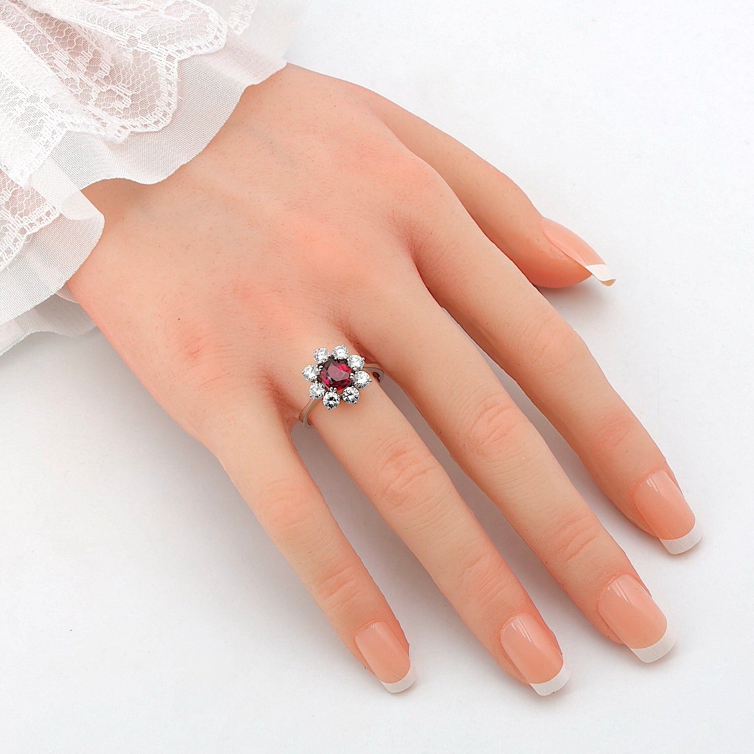 Entourage ring in 750 white gold with a Ruby approx. 0.95 ct and brilliants with a total of approx. 1.1 ct