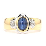   Ring in 750 yellow gold with a blue sapphire cabochon and diamonds