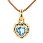 Pendant in 750 bicolor gold with a blue topaz