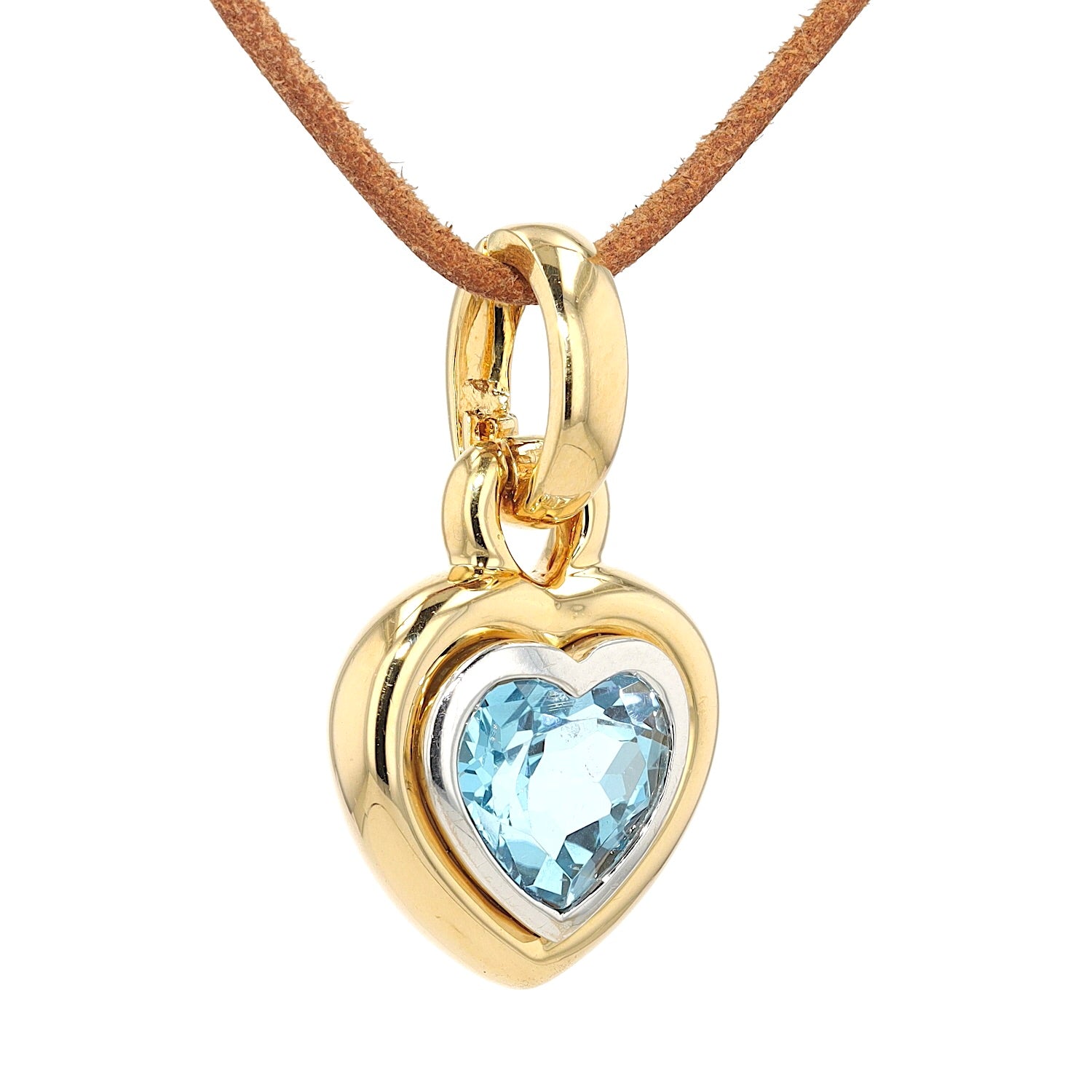 Pendant in 750 bicolor gold with a blue topaz