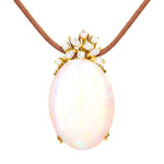 Pendant in 750 yellow gold with a precious opal and approx. 0.60 ct brilliants and diamonds