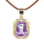 Vintage pendant in 585 yellow gold with an amethyst