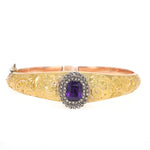 Antique bangle in 750 gold with an amethyst and diamonds, lying frontally