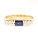 Ring in 750 yellow gold with a sapphire and brilliants