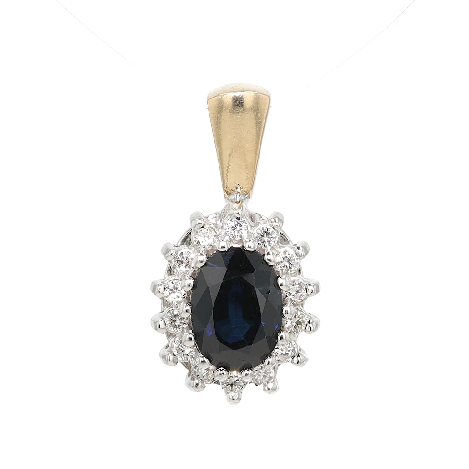 Pendant from Christ in 585 bicolor gold with a sapphire and brilliants