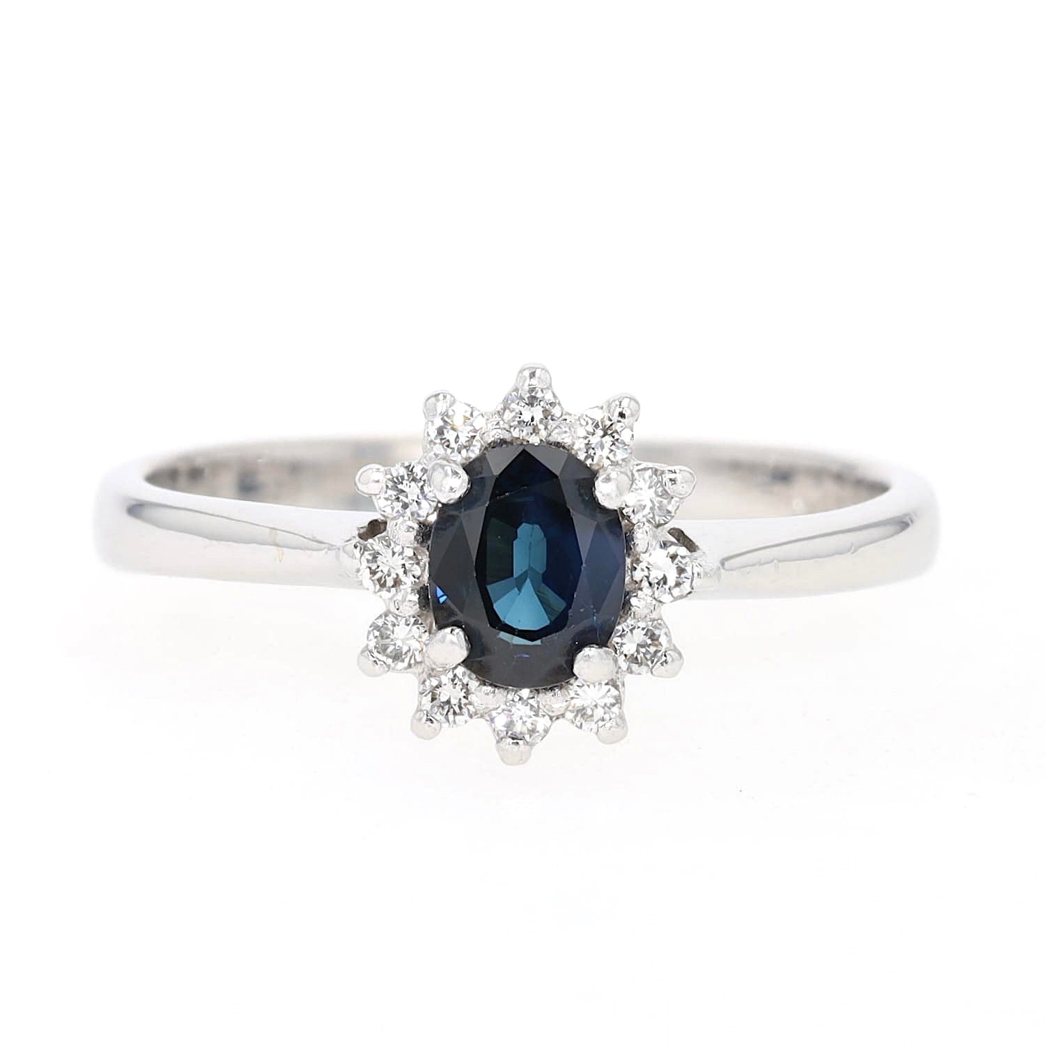 Ring in 585er Weißgold mit einem Saphir und Brillanten, liegend frontal