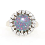 Ring in 585er Weißgold mit einer Opal-Triplette und ca. 0,60 ct Brillanten, liegend frontal