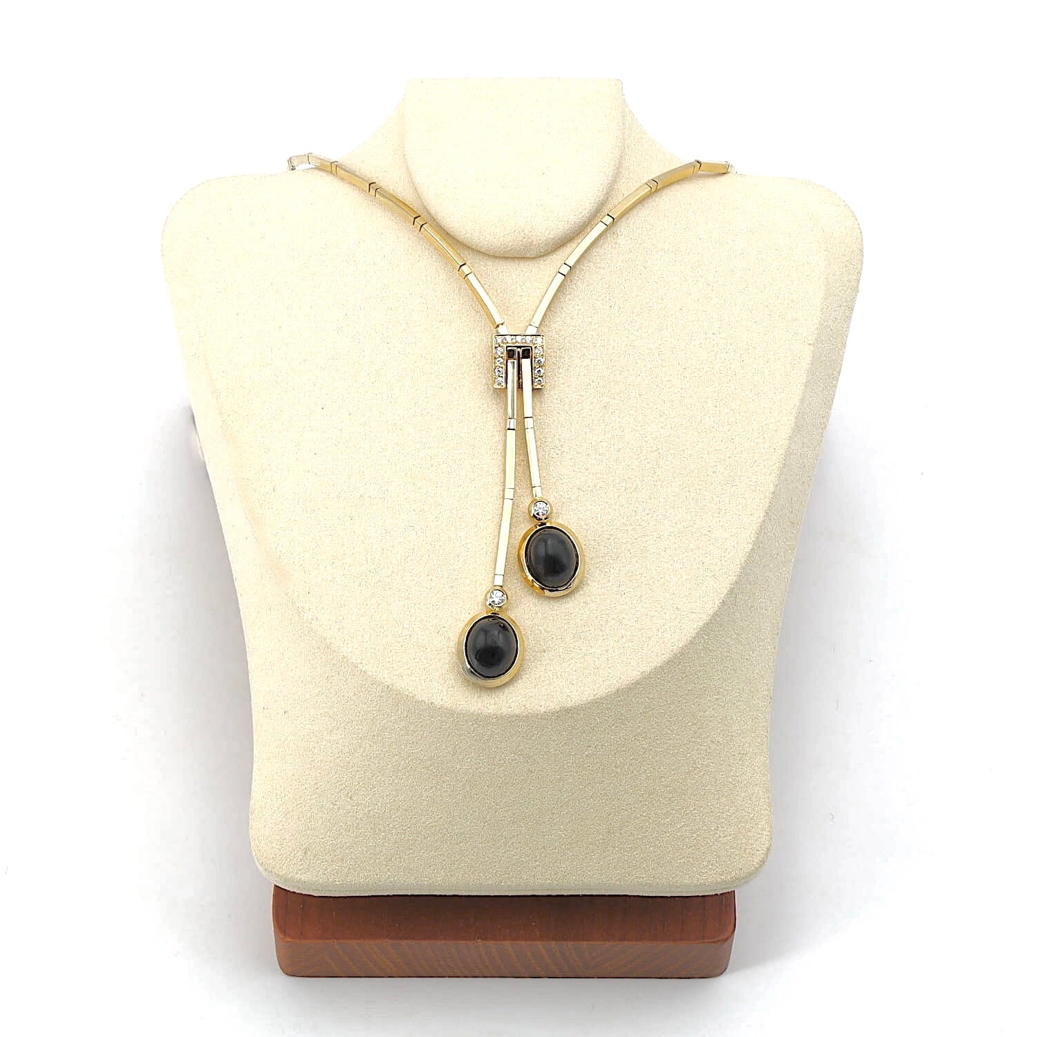 Poniros Collier aus 750er Gelbgold mit Brillanten und Onyx-Cabochons