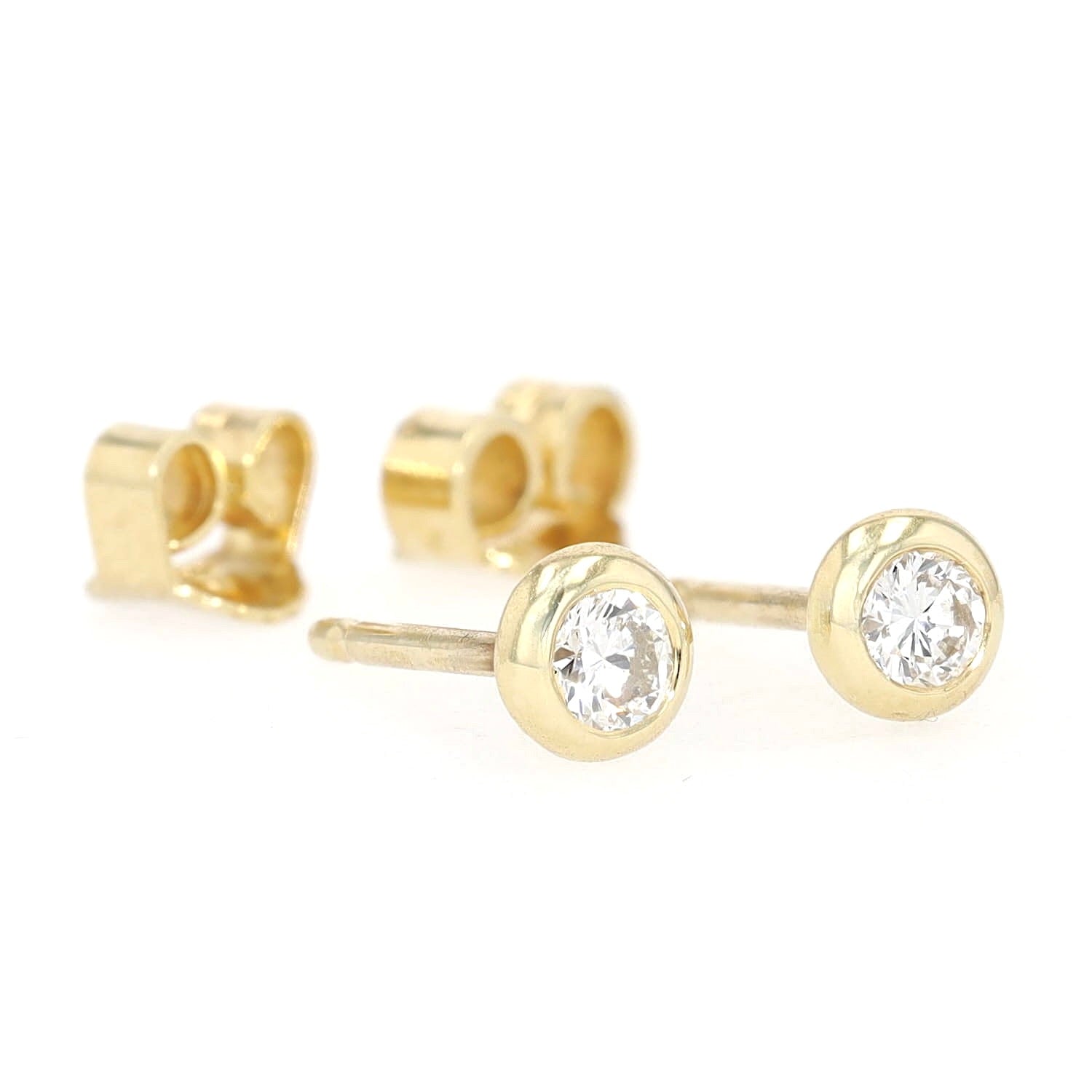 1 pair of stud earrings in 585 yellow gold, each with a brilliants