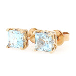 Pair of stud earrings in 585 yellow gold, each with a blue topaz