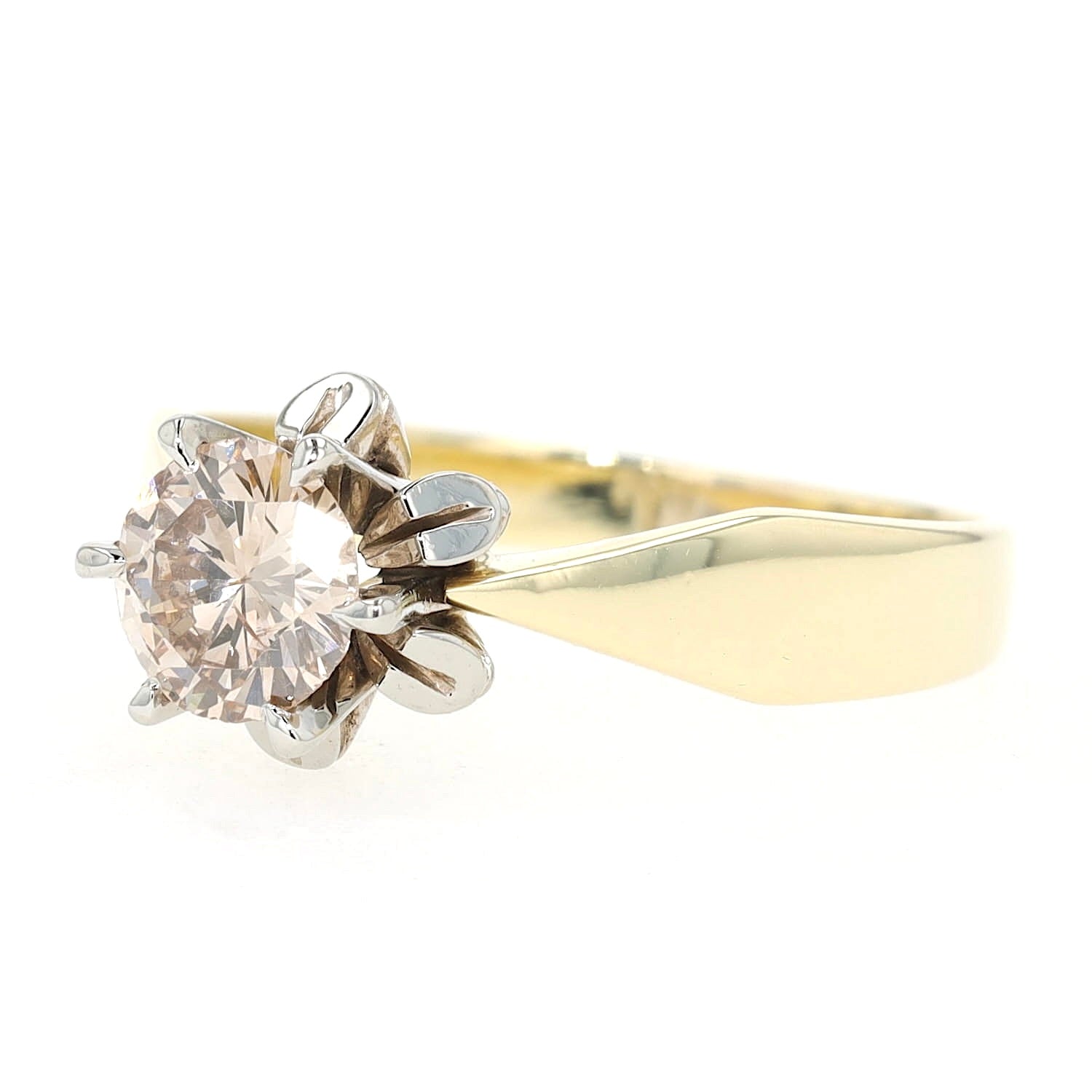 Solitaire ring in 585 bicolor gold with a brilliants approx. 0.77 ct, turned horizontally to the left