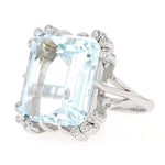 Vintage ring in 750 white gold with a large aquamarine and diamonds, turned horizontally to the left