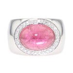 Statement ring made from 750 white gold with a pink tourmaline cabochon and brilliants