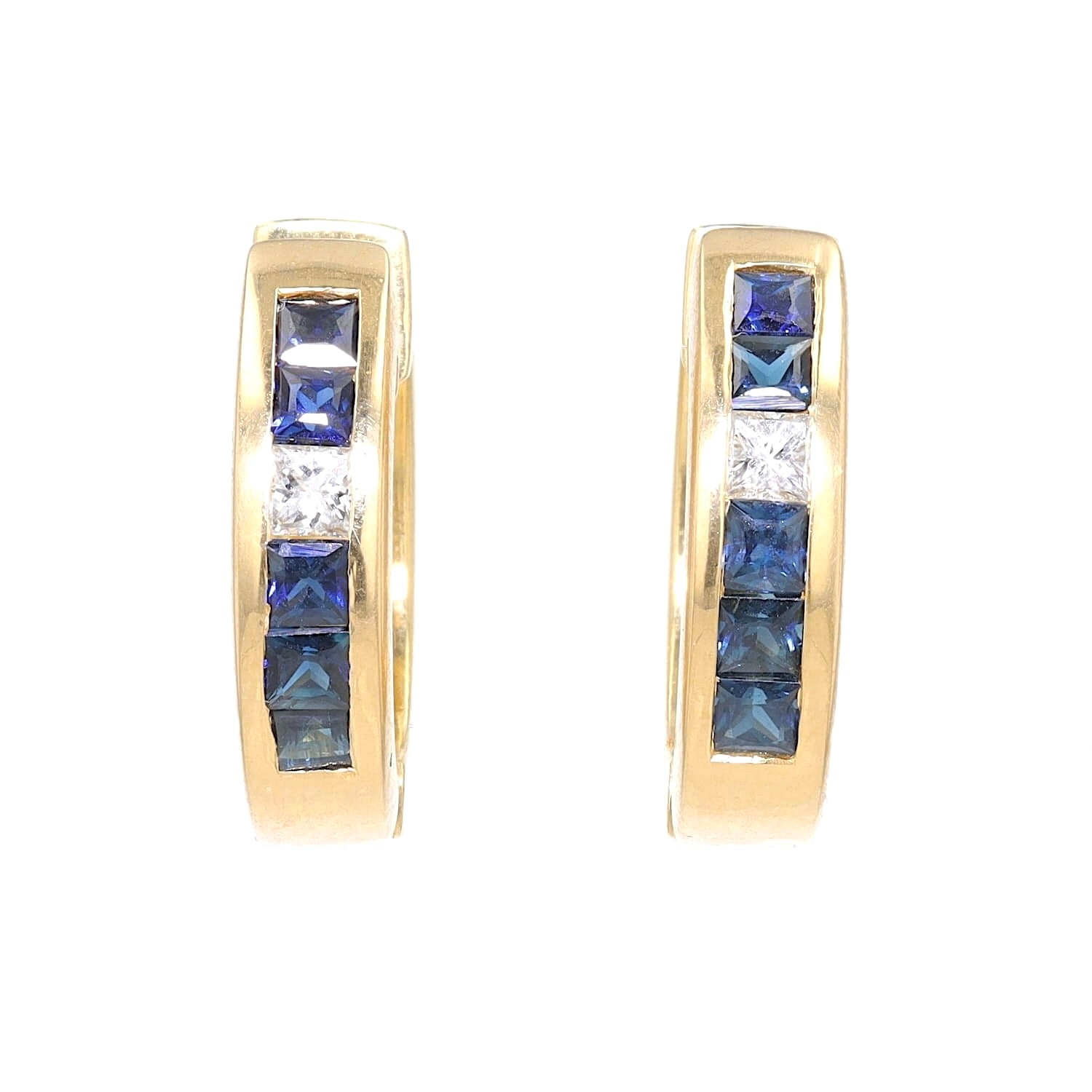 A pair of creoles in 750 yellow gold with diamonds and sapphires, standing frontal