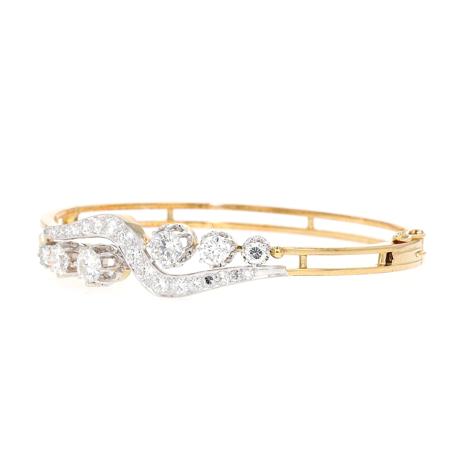 Vintage bangle in 585 gold with a total of approx. 2.9 ct brilliants and diamonds, turned horizontally to the left