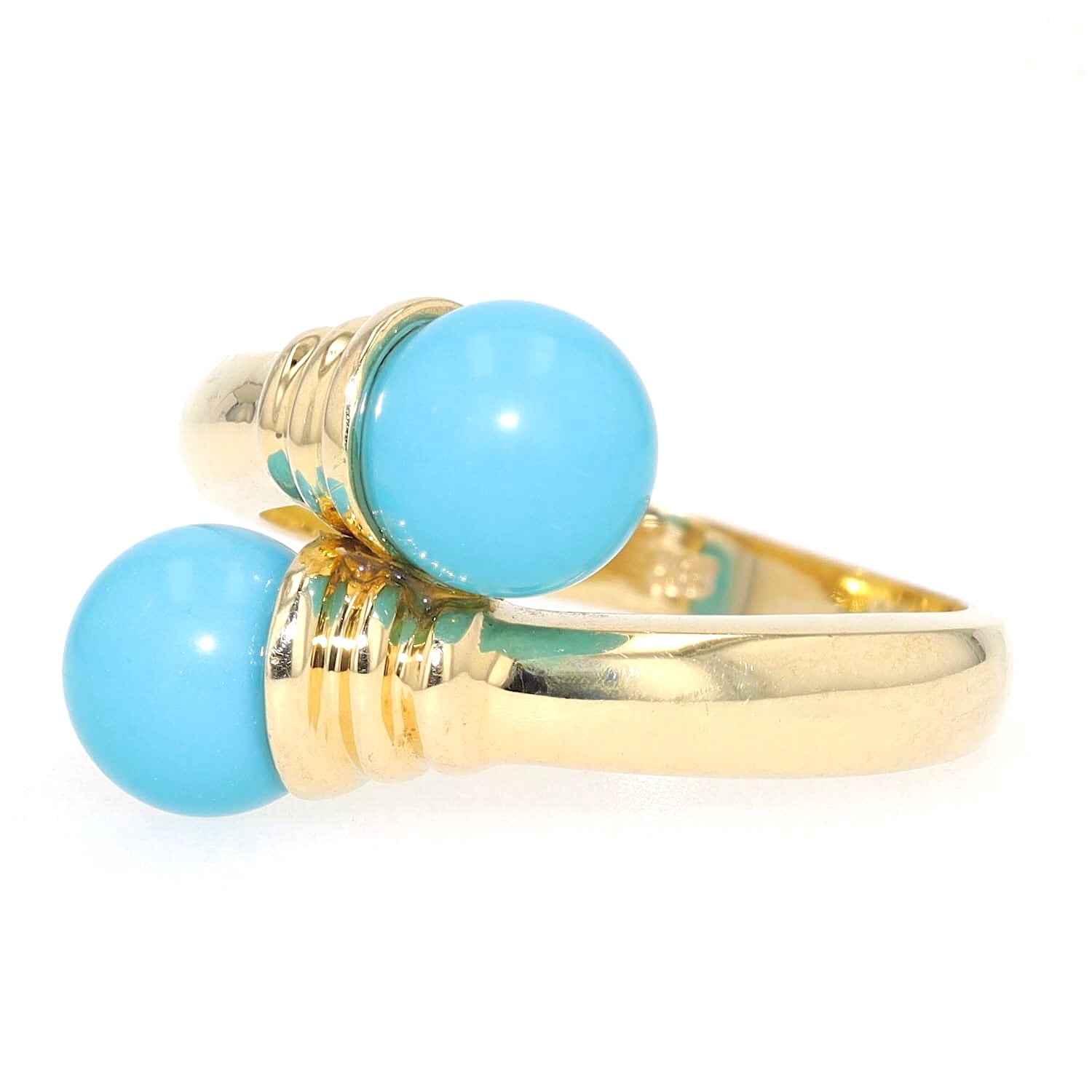 Ring in 585 yellow gold with two turquoise spheres, turned horizontally to the left