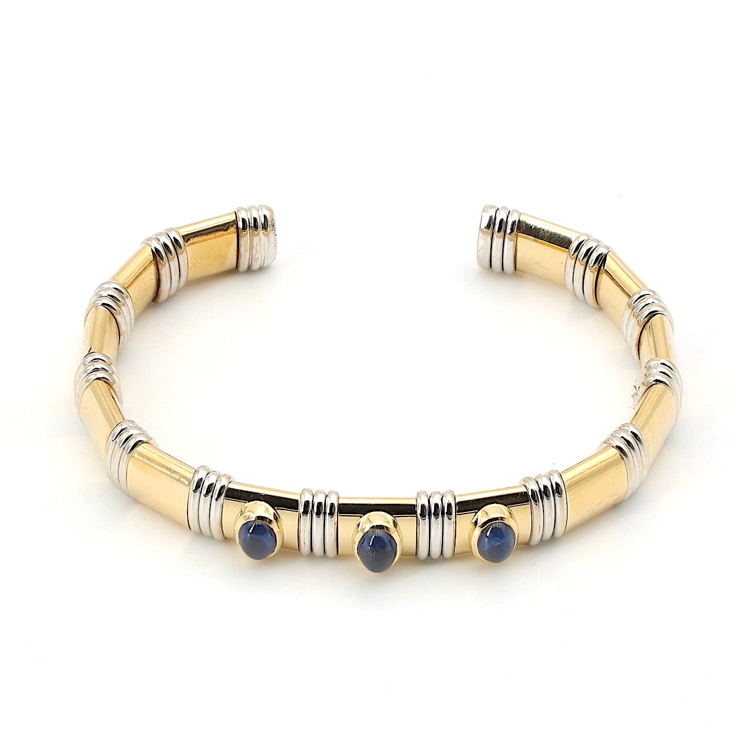 Bangle in 750 yellow and white gold with sapphire cabochons, horizontal top view