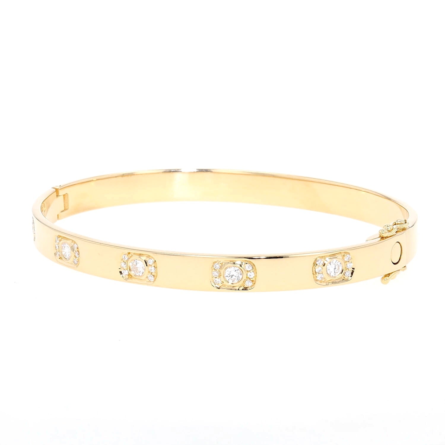 Armreif in 750er Gelbgold mit insgesamt ca. 0,60 ct Brillanten, liegend links gedreht