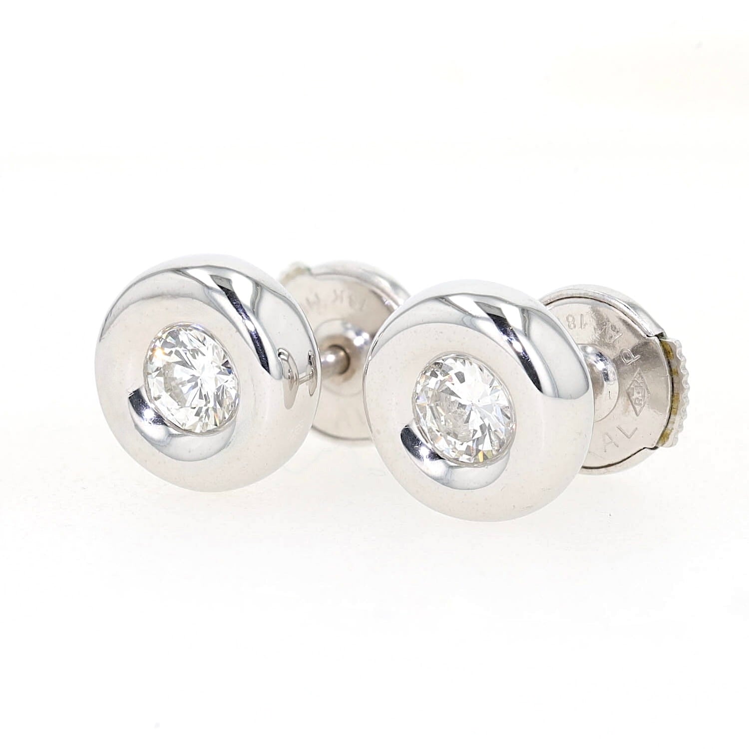 Ohrstecker in 750er Weißgold mit je einem Brillanten  , liegend links gedreht
