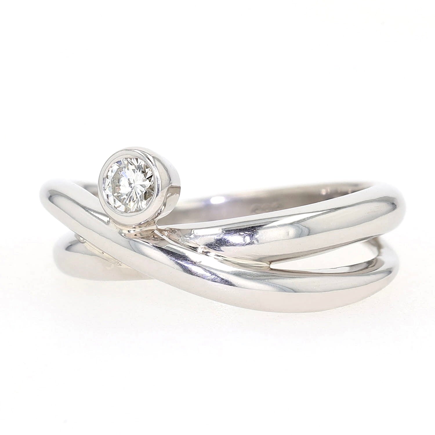 Ring in 585er Weißgold mit einem Brillanten, liegend frontal