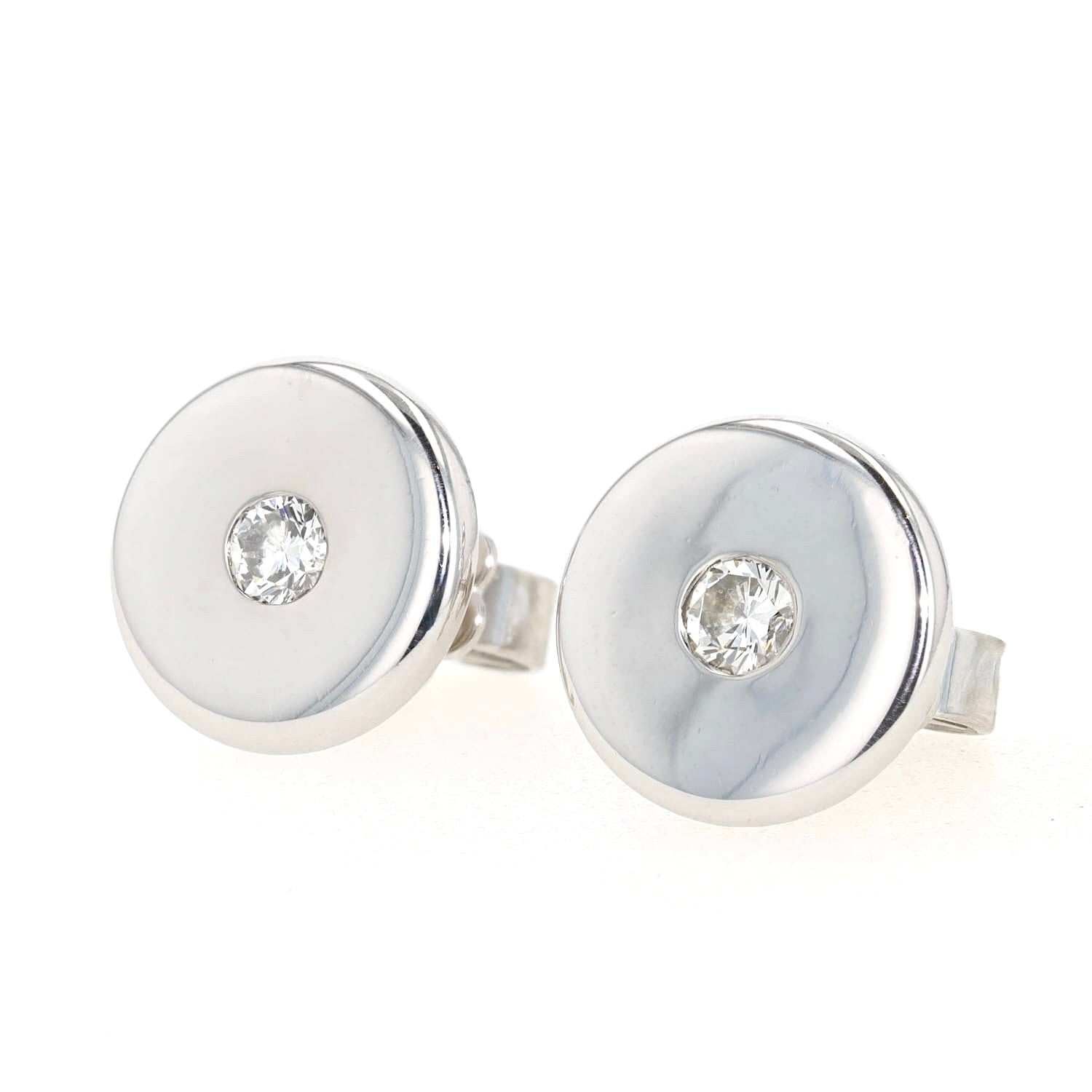 Ohrstecker in 750er Weißgold mit je einem Brillanten, liegend links gedreht