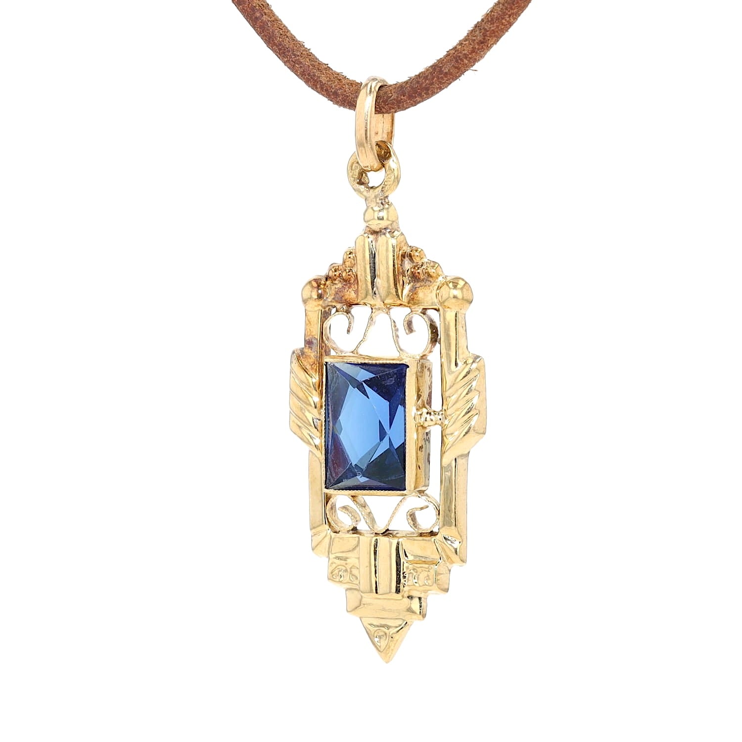 Antiker Anhänger in 585er Gelbgold mit einem blauen Glasstein, hängend links gedreht