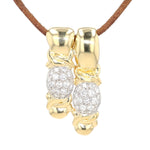 Anhänger in 750er Gelbgold mit Brillanten, hängend an einem braunen Lederband frontal