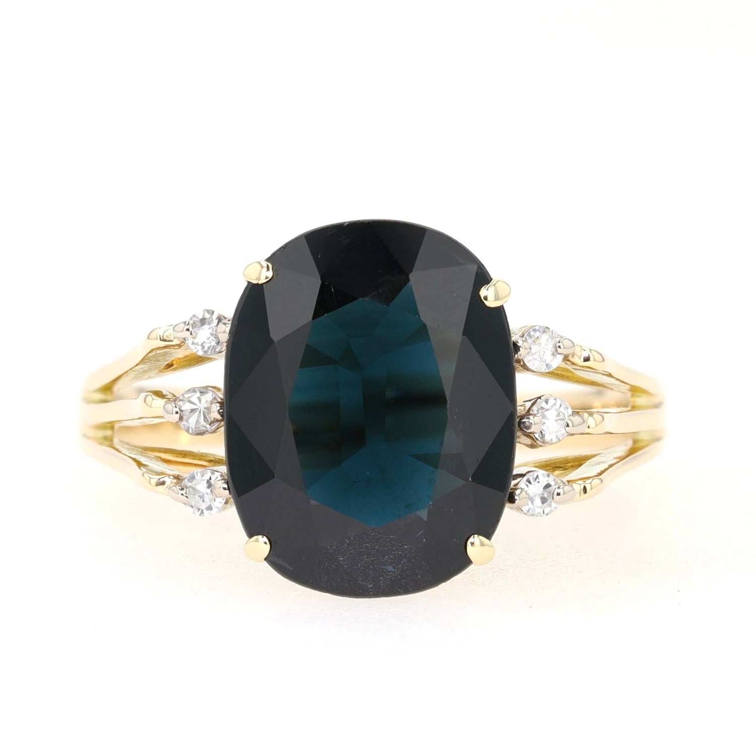 Ring in 585er Gelbgold mit einem blauen Saphir und Diamanten, liegend frontal