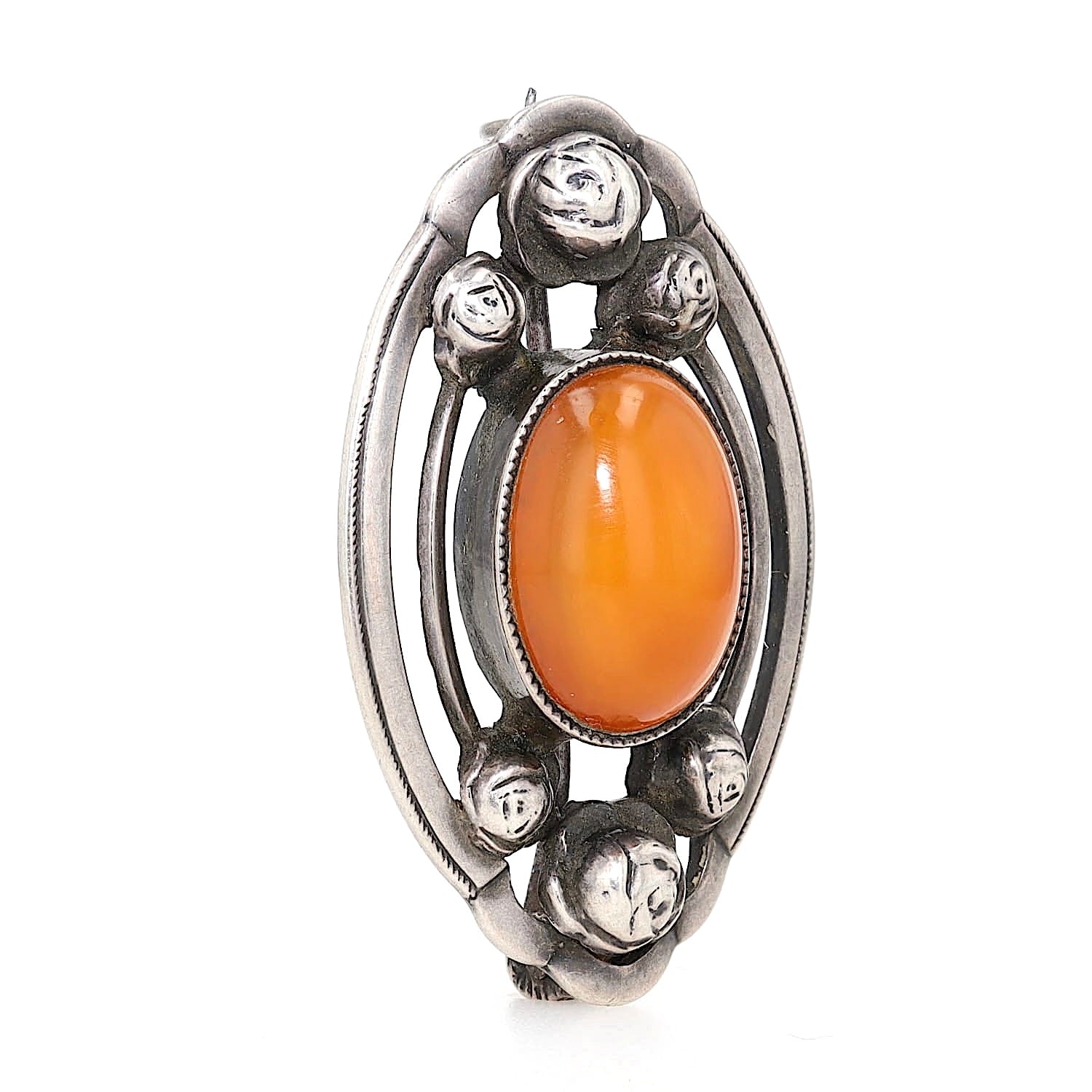 Jugendstil Brosche in 800er Silber mit einem Butterscotch Bernstein, stehend rechts gedreht