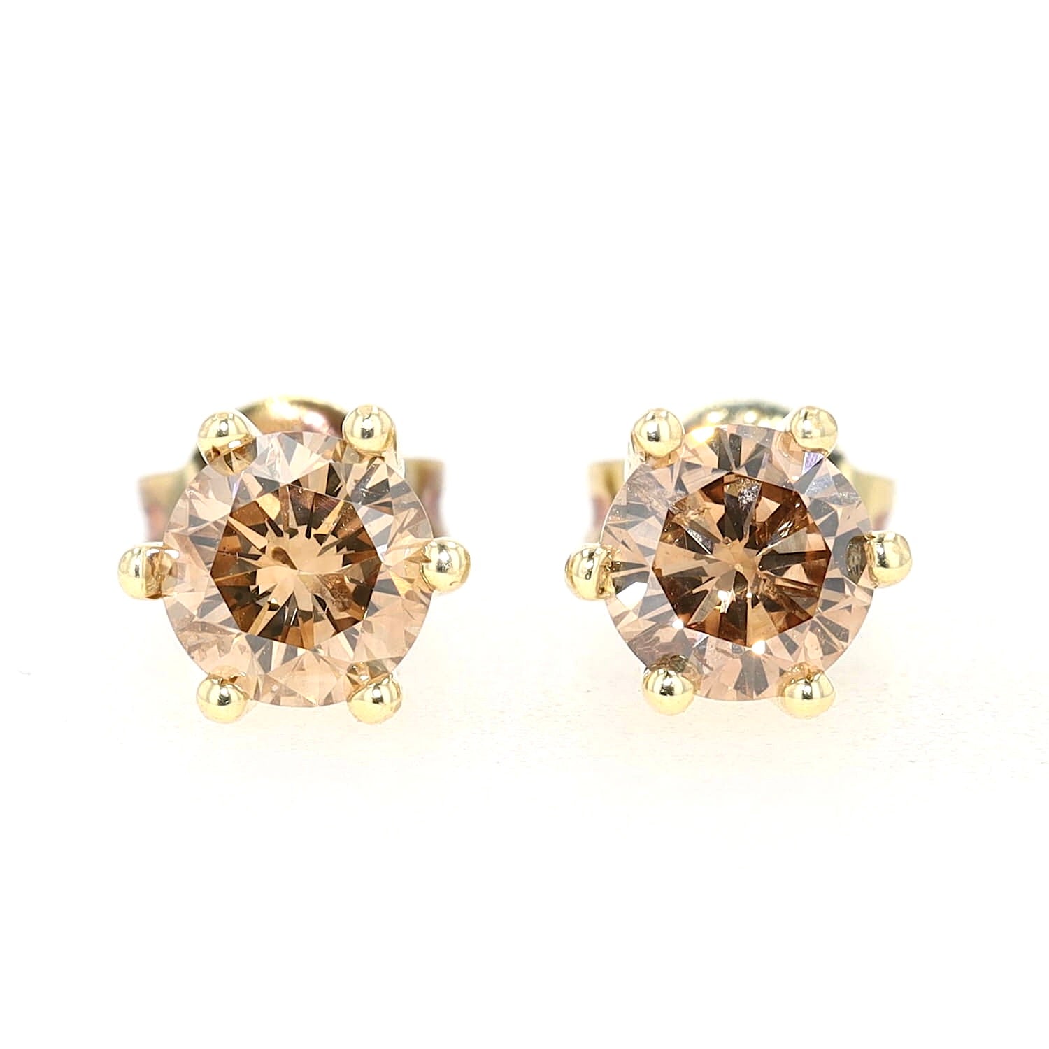 Ohrstecker in 585er Gelbgold mit Fancy Brillanten, zusammen ca. 1,19 ct, liegend frontal