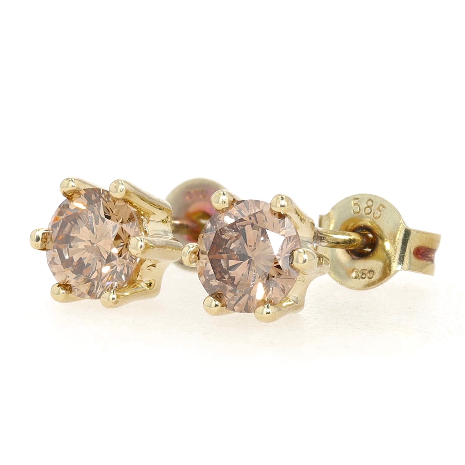 Ohrstecker in 585er Gelbgold mit Fancy Brillanten, zusammen ca. 1,19 ct, liegend links gedreht mit Stopper