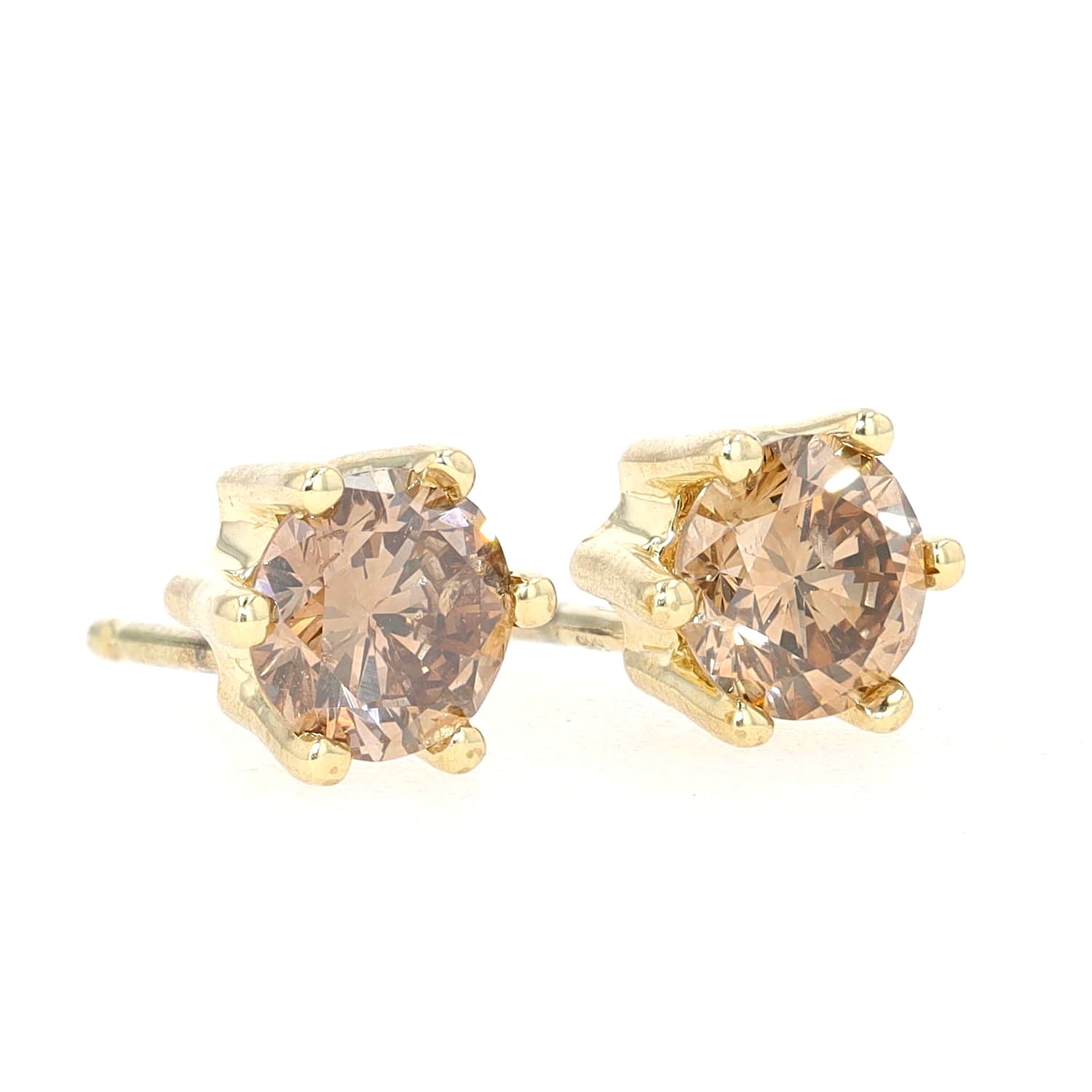 Ohrstecker in 585er Gelbgold mit Fancy Brillanten, zusammen ca. 1,19 ct, liegend rechts gedreht ohne Stopper