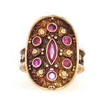Vintage-Ring in 585er Rotgold mit synthetischen Rubinen, liegend frontal